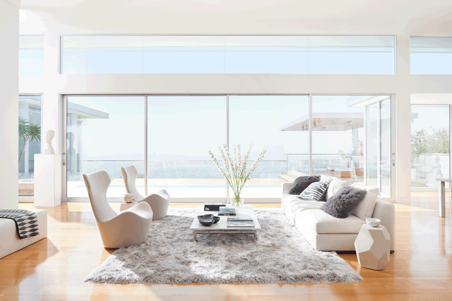 minimalism living room design floor to ceiling windows before window treatments Fort Myers 33908