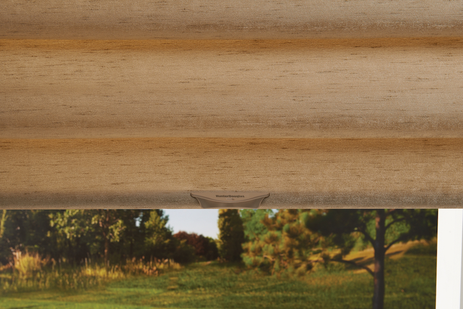 Roman shades in Florida home to add energy efficiency during the changing season.