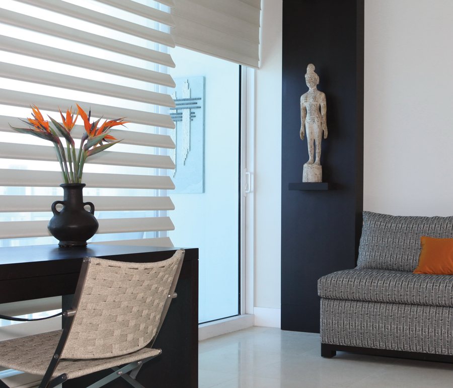 contrast in living room design with white Hunter Douglas pirouette shades Fort Myers 33908