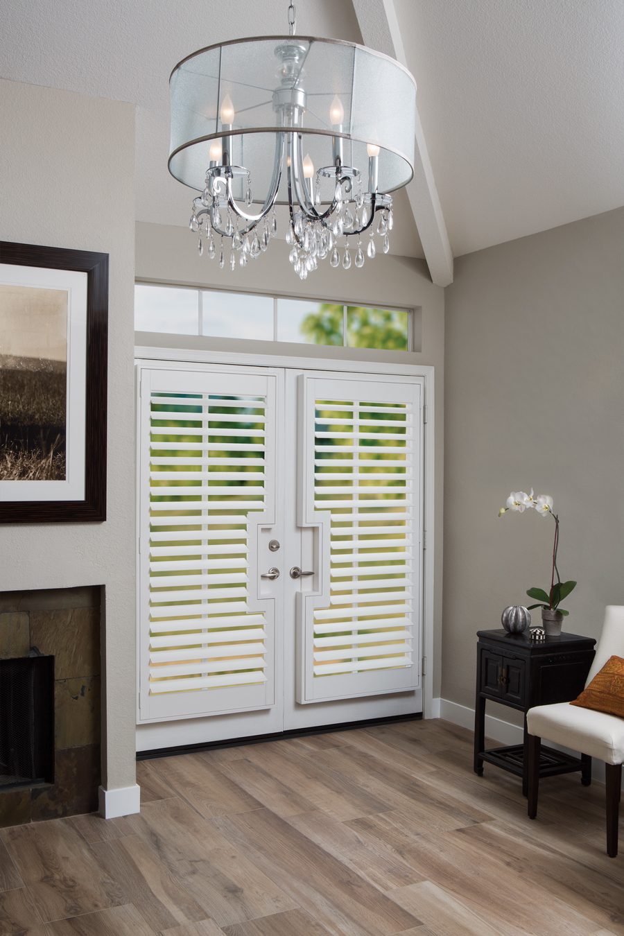 decorating with shades of white in entryway with plantation shutters on french doors Fort Myers 33908