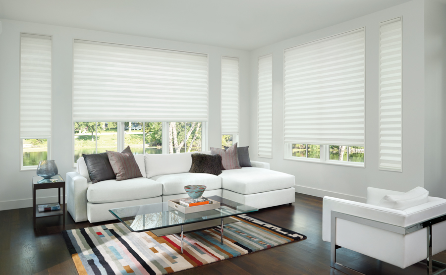 white living room with custom solera roman shades Hunter Douglas Fort Myers 33908