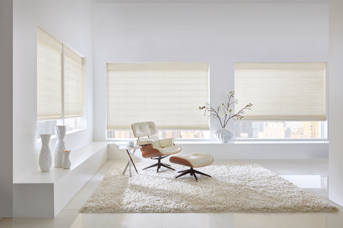 Woven woods shades add texture in living room decorated with white Fort Myers 33908