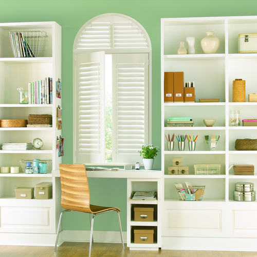 maximalist design inspired by Iris Apfel with arched plantation shutters Fort Myers 33908