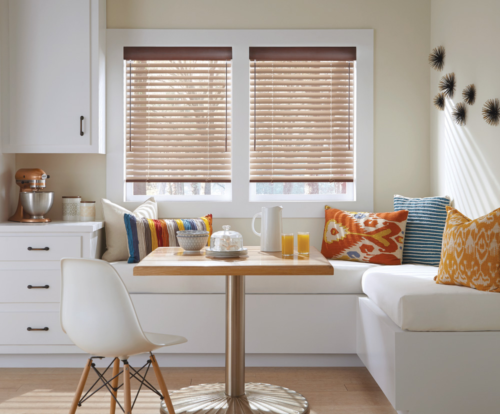 dining nook with mixed patterns on accent pillows Naples 34119