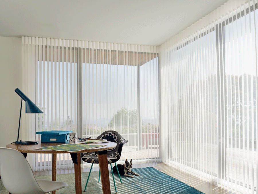 Sheer window treatments to reduce glare in your home office.