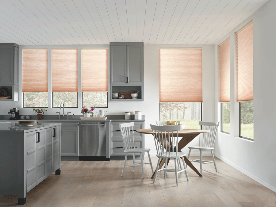 Kitchen transformation with window treatments to block harsh light.