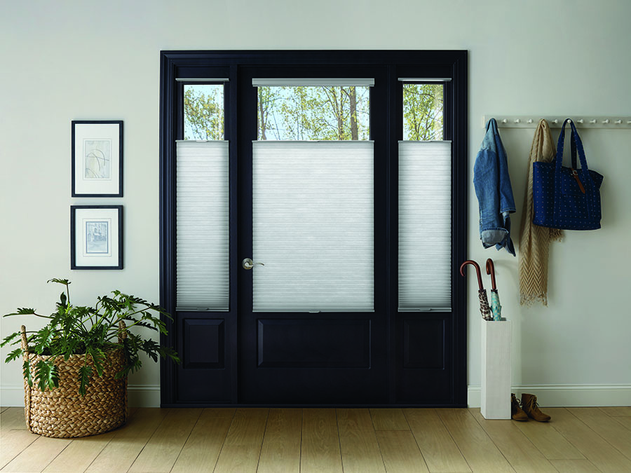 Entryway doors with Honeycomb shades for increased safety.