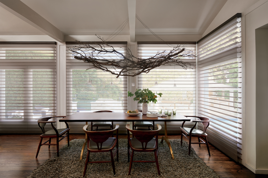 Sheer shades offer soft light in Fort Myers dining room