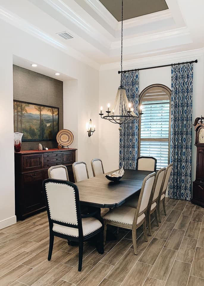 dining room with long paneled draperies Fort Myers, FL