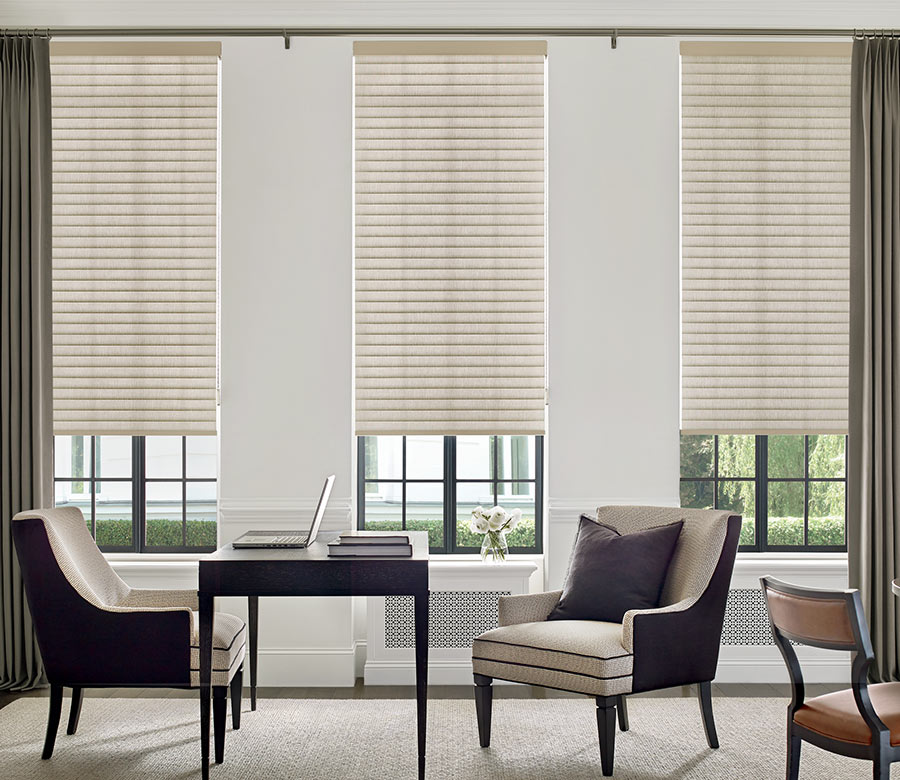 cellular roller shades on home office windows with drapery side panels