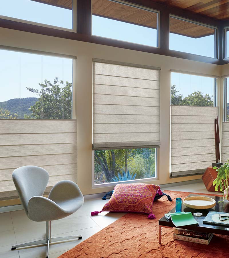 woven roman shades with top down feature in loft living room in naples FL