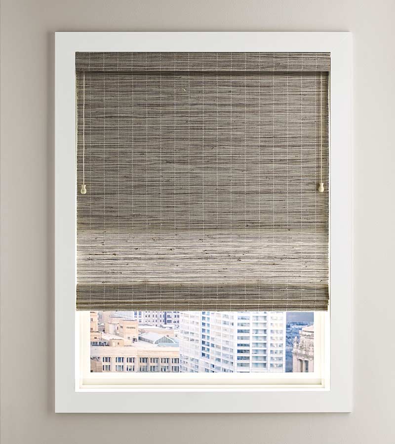 white framed window overlooking city with fabric shade in Fort Myers 33908