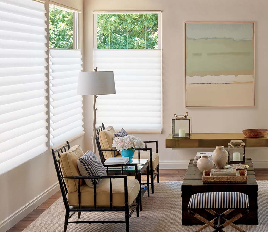 beige rustic living room with white fabric shades