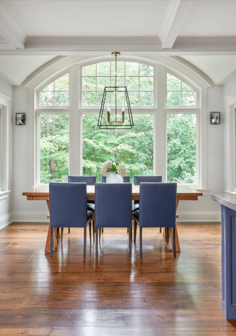 Dining room with purple chairs