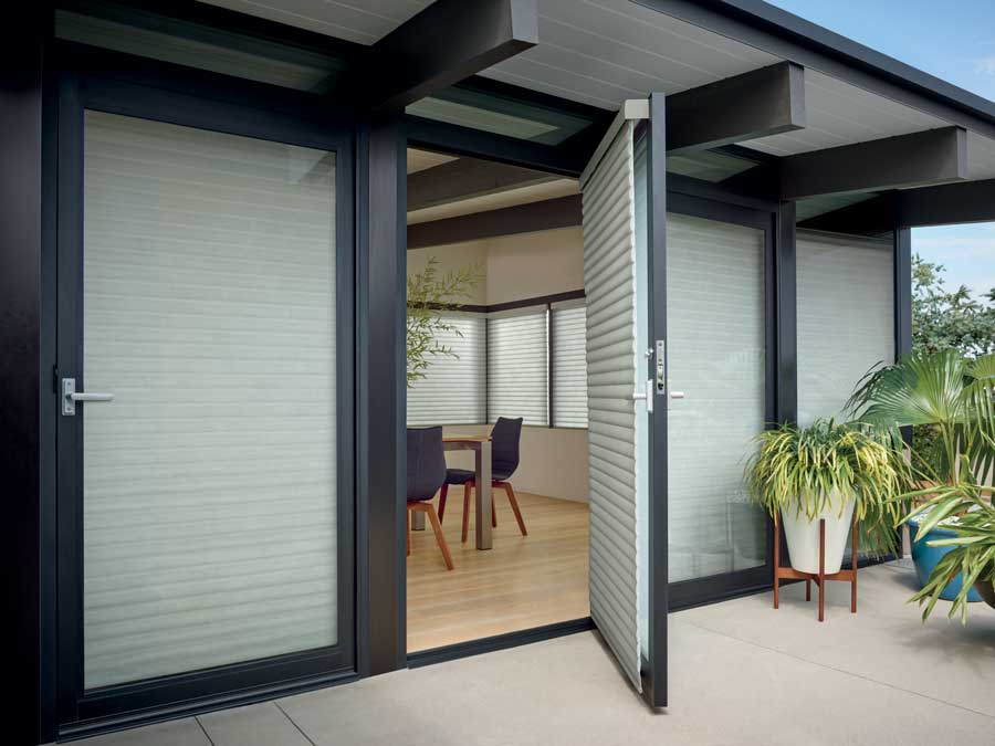 outdoor doors leading to backyard black trim 