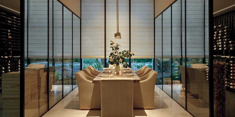 modern dining room with wine room on each side