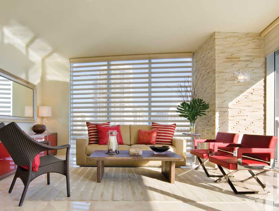 hunter douglas nuetral living room with red accents in ft myers florida