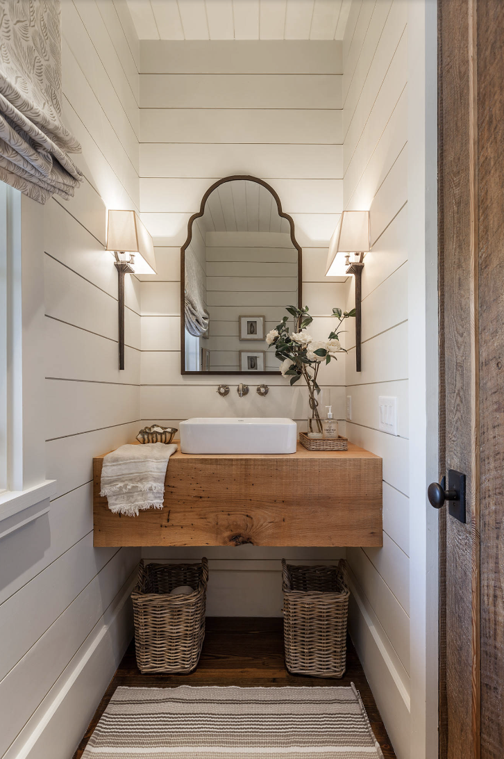 powder room with shiplap walls