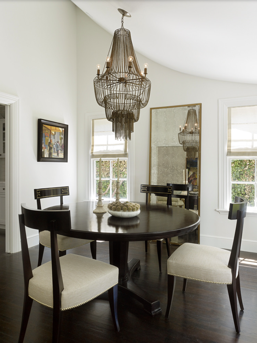 add a tall mirror in the dining room to make your space look larger