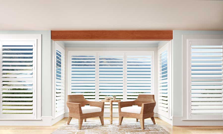 white shutters in sunroom niche area