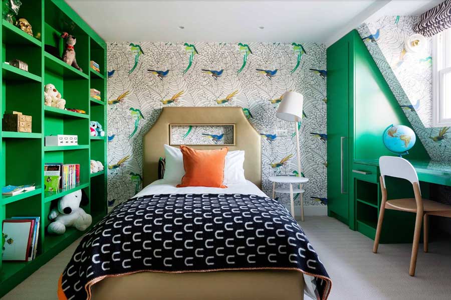 child's room with green painted built-ins and desk for school work