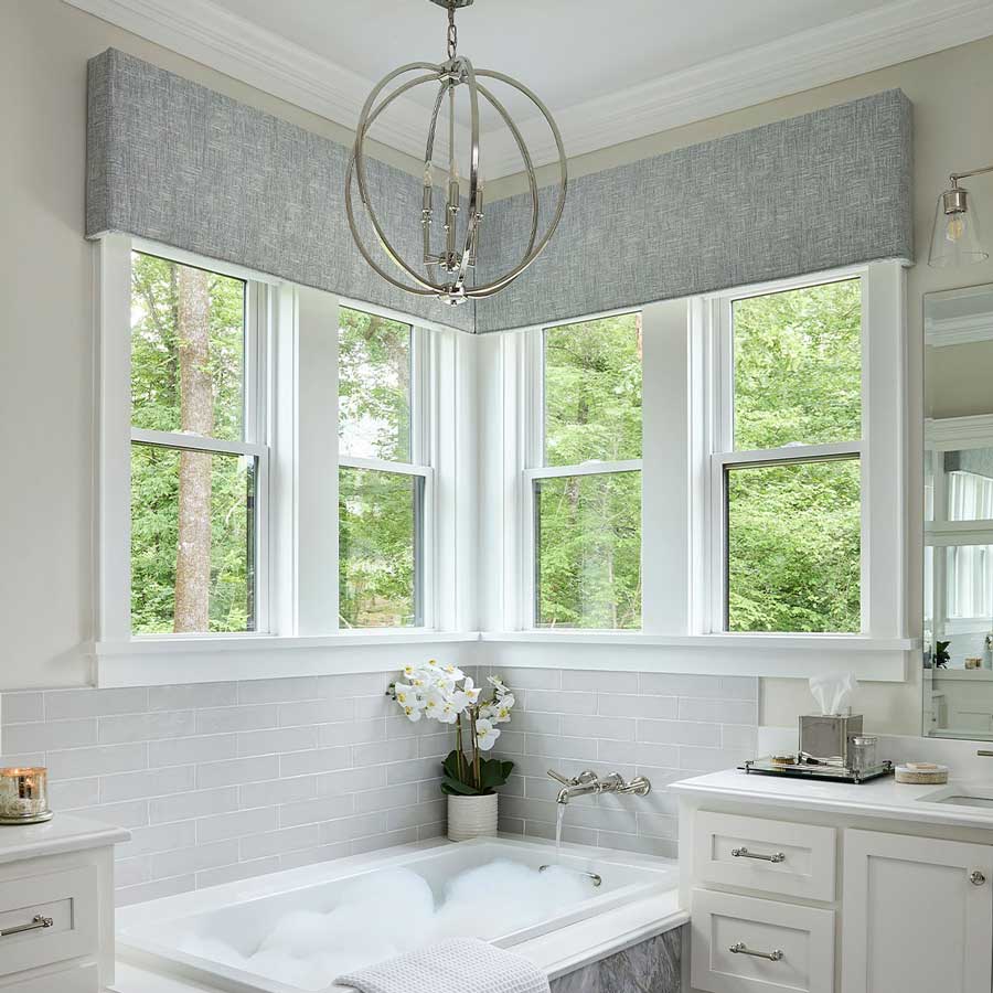 bathroom window single hung windows and fabric cornice boards at the top of the windows