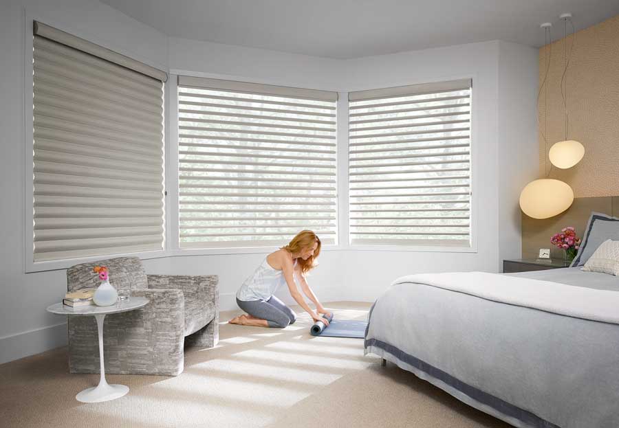 pirouette shades on bay windows in bedroom of Naples FL home