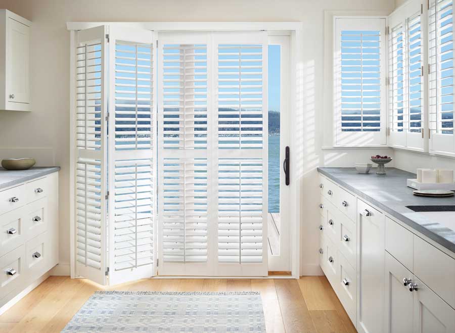 white shutters bi-fold for sliding glass door window treatments in Naples FL
