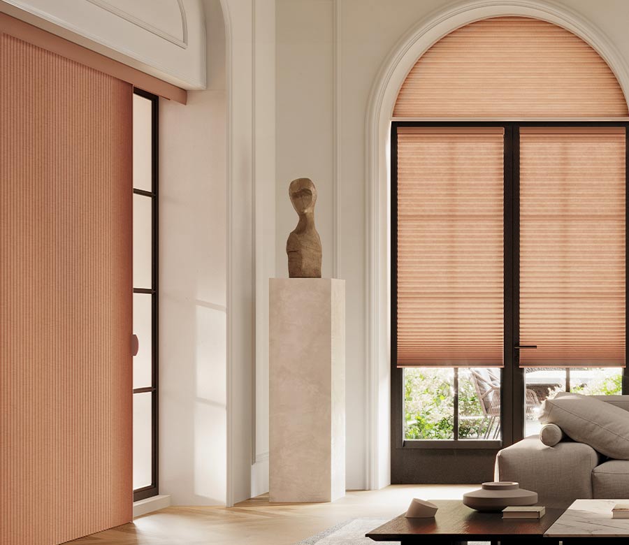 living room with peach vertical cellular shades