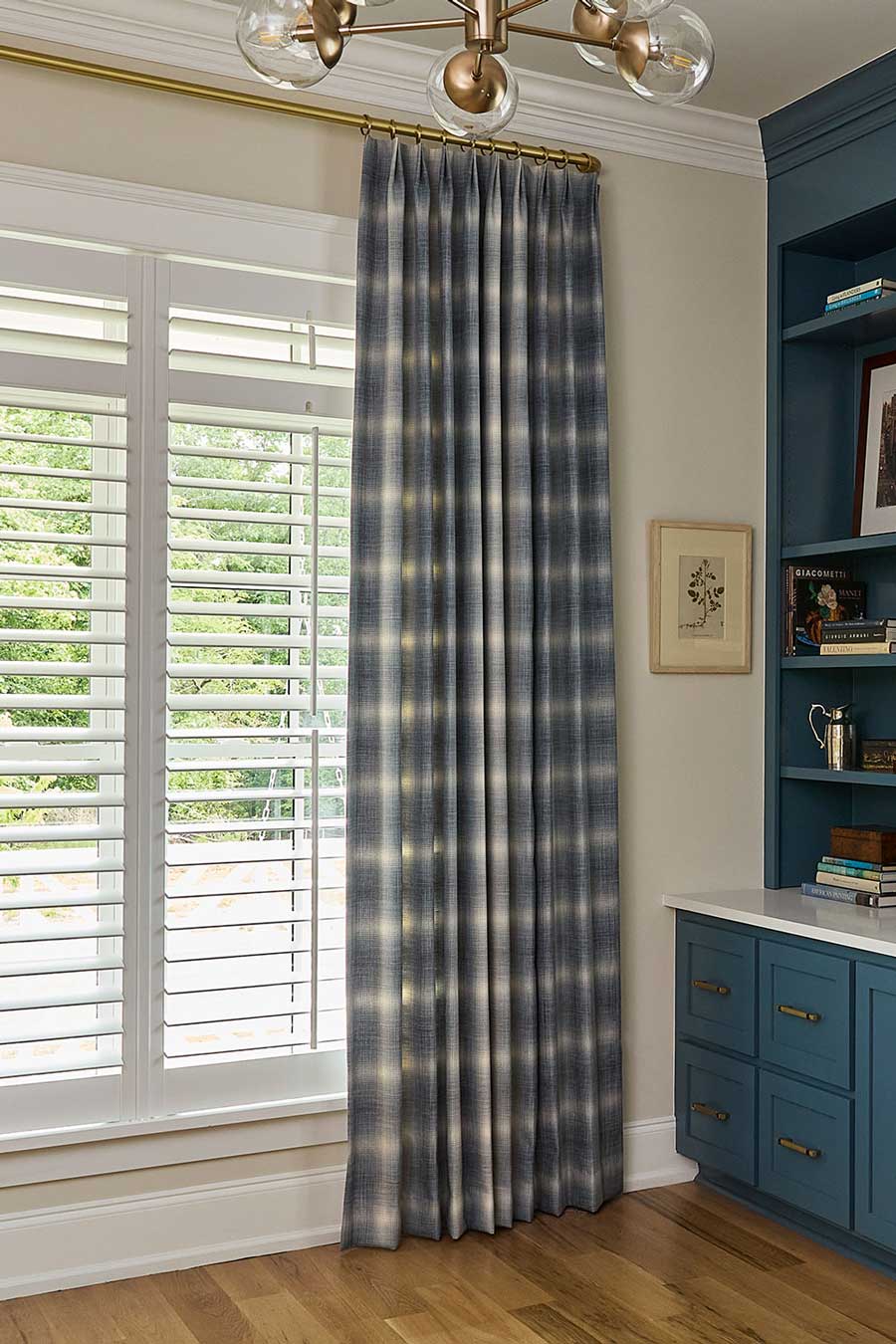 contemporary plaid blue drapes on gold curtain rod with shutters in home office