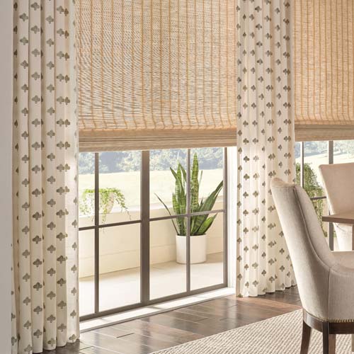 woven wood shades and drapery together on the window