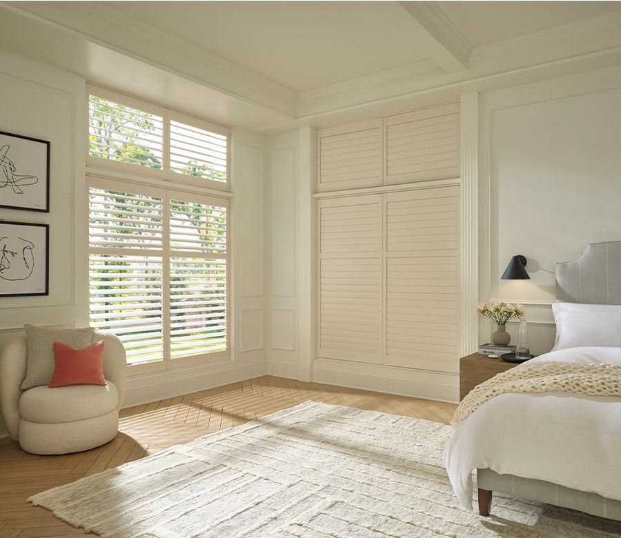 white vinyl shutters in bedroom