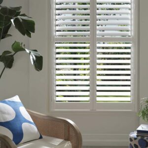 White Palm Beach™ PolySatin™ Shutters with motorized louvers