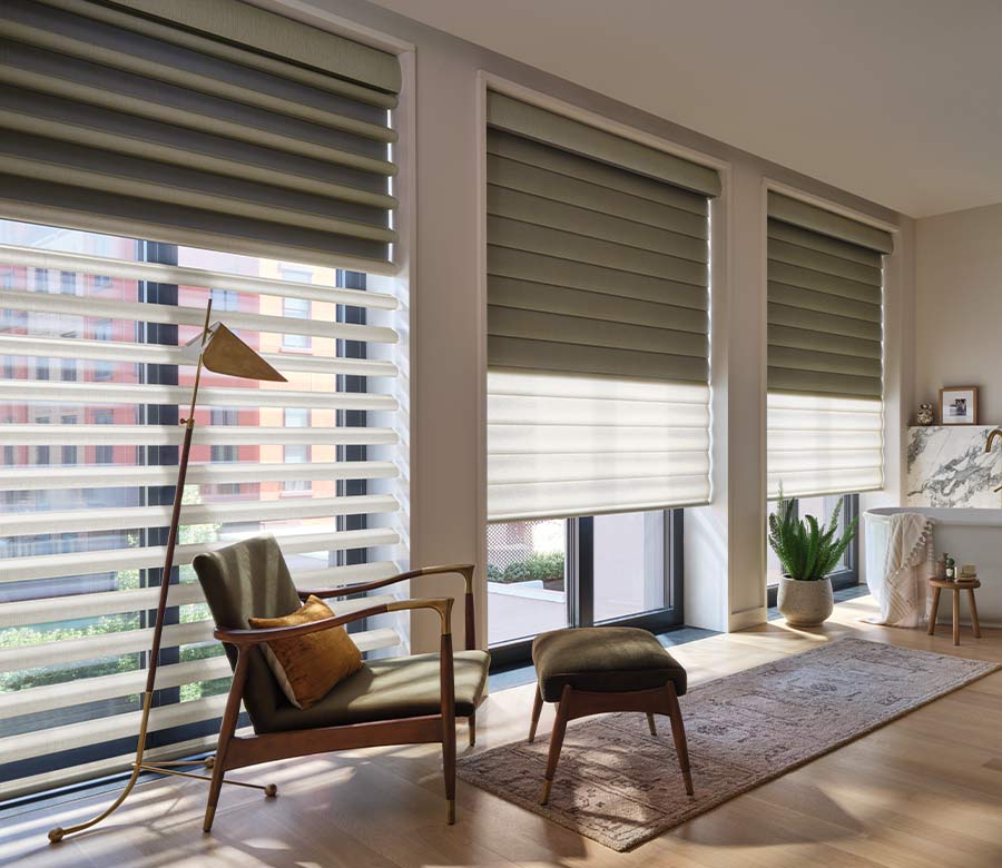pirouette-window-treatments-dual-opacity-shades-floor-to-ceiling-hunter-douglas-at-home-blinds-and-decor floor to ceiling pirouette window treatments