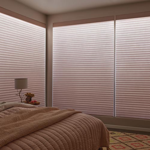 Sonnette cellular roller shades with Aura illuminated lighting feature