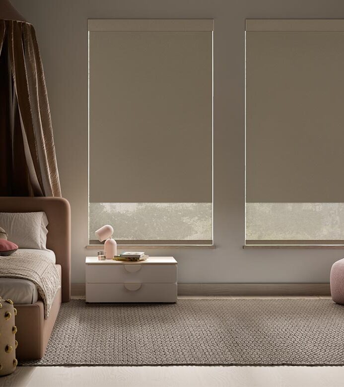 child room with designer screen shades for safety and added darkness