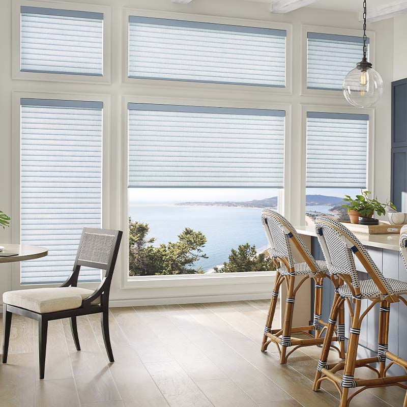 motorized shades on hard-to-reach windows for simple light control and privacy